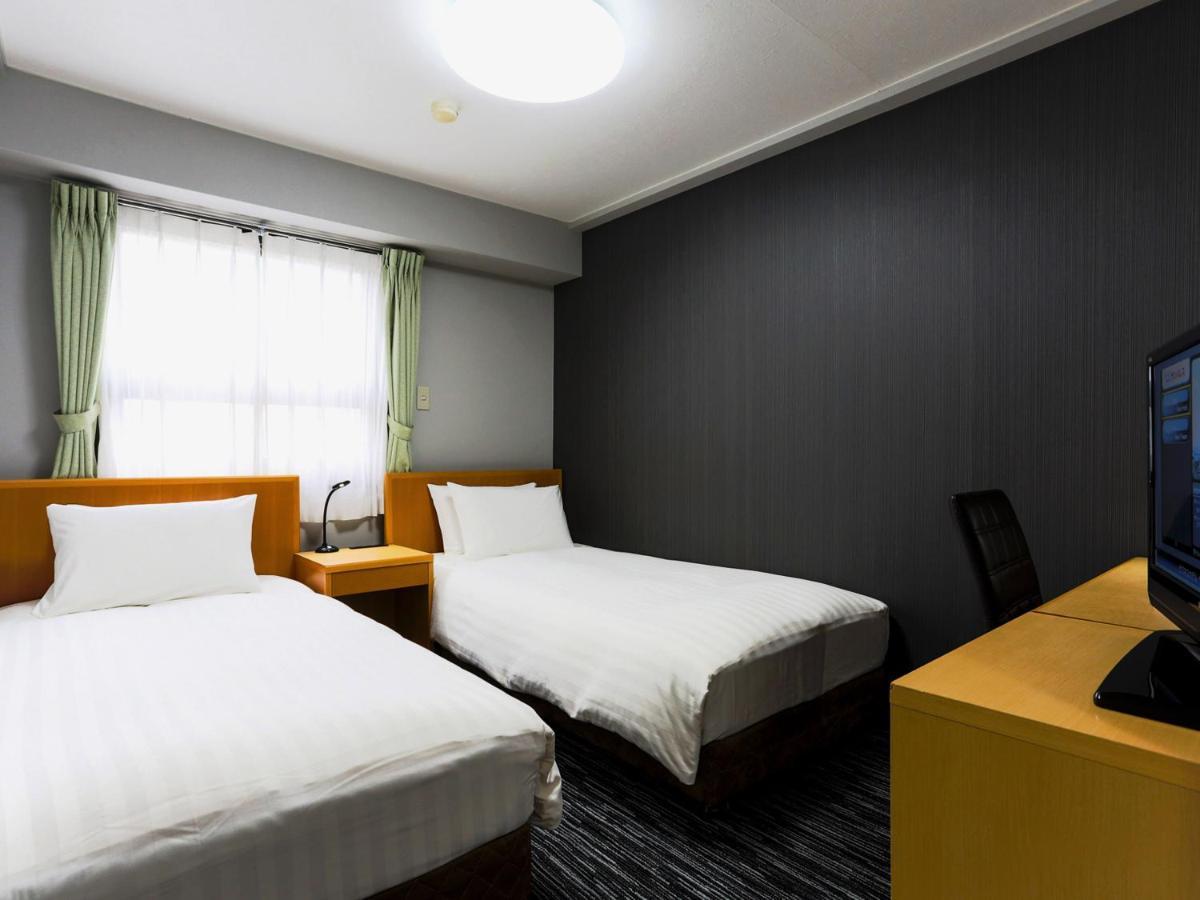 Business Hotel Sunpalace Tokyo Exterior photo